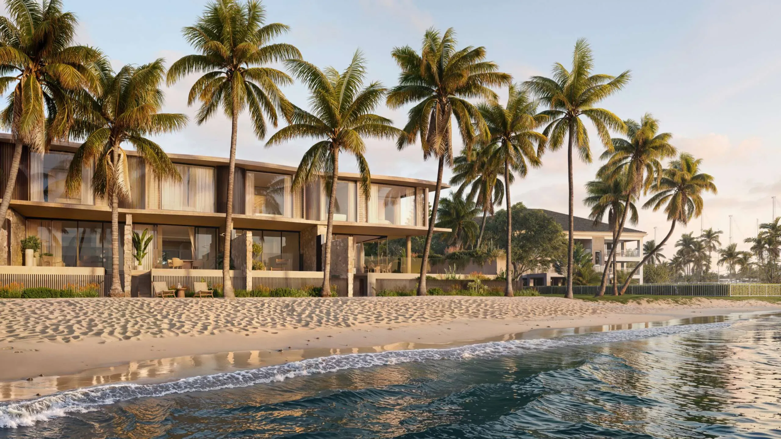 Wayfarer residences on their private beach at golden hour